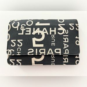 2002 Chanel Vintage wallet on a chain.